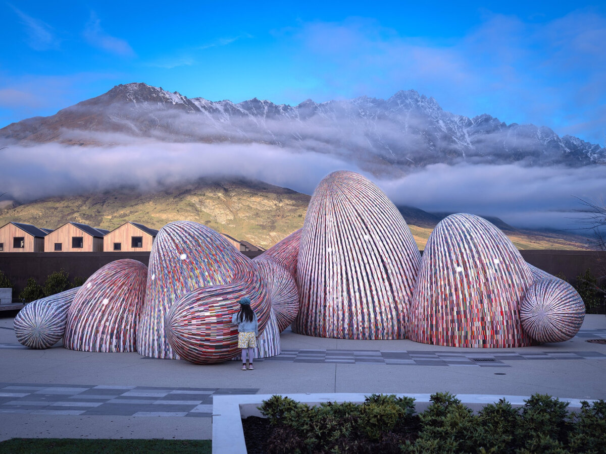 ENESS' glowing, interactive AI oracles question digital futures near new zealand mountains