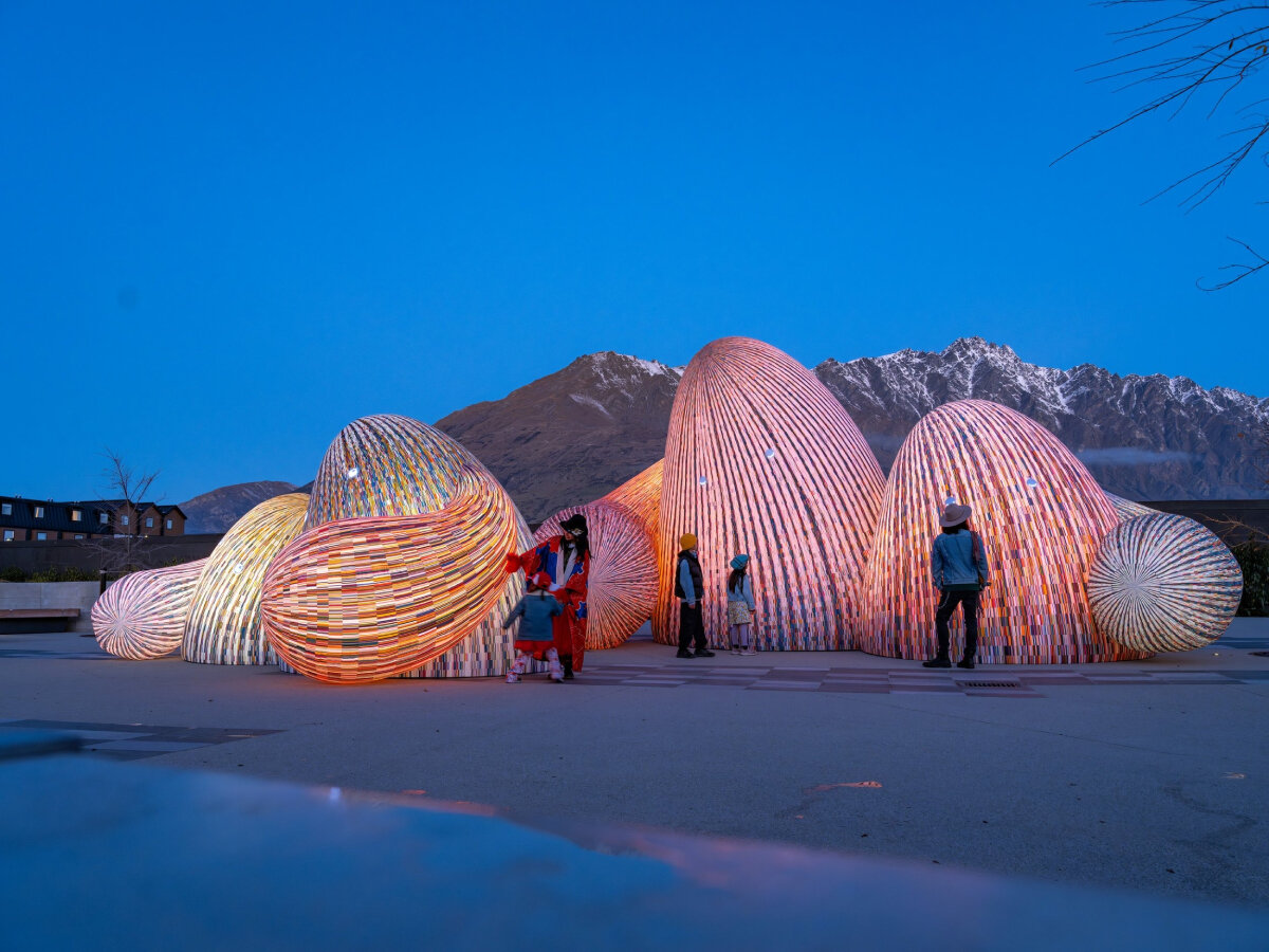 ENESS' glowing, interactive AI oracles question digital futures near new zealand mountains