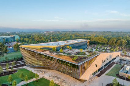 folded glass facade fronts AWSOM medical school’s new arkansas building